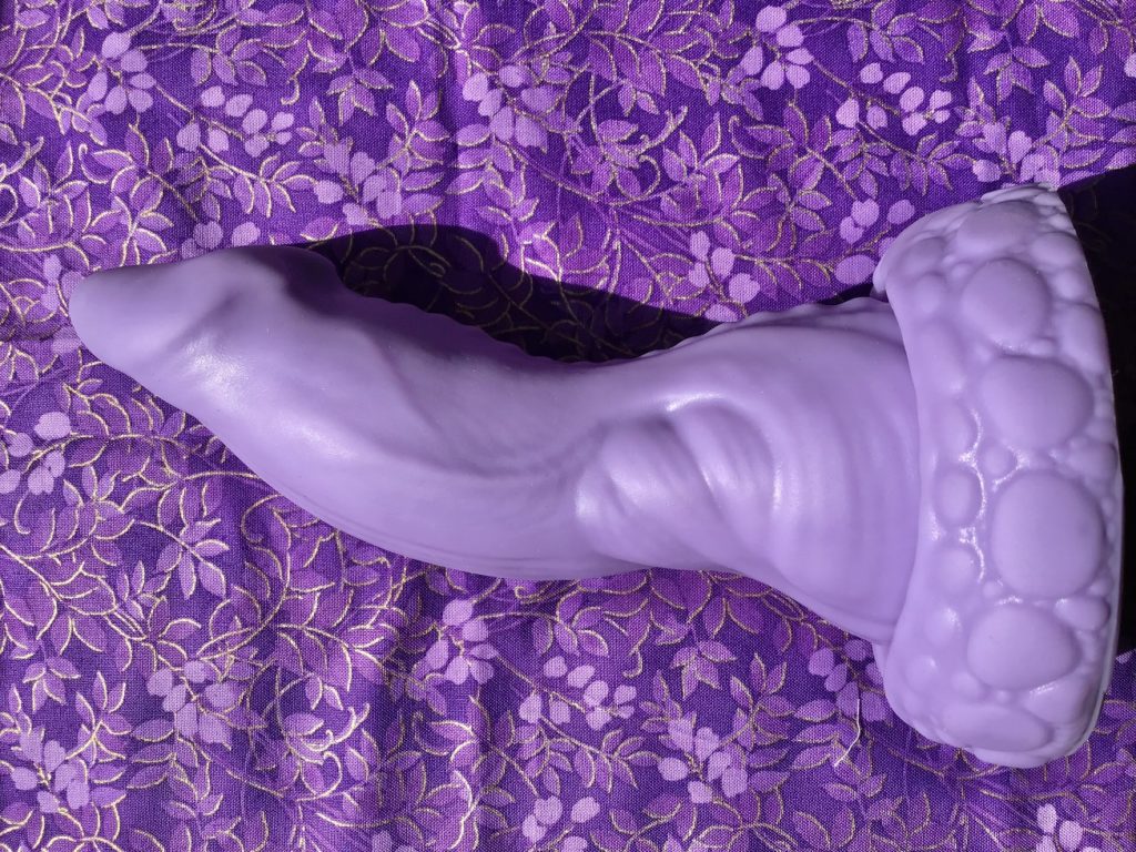 Nox on purple fabric