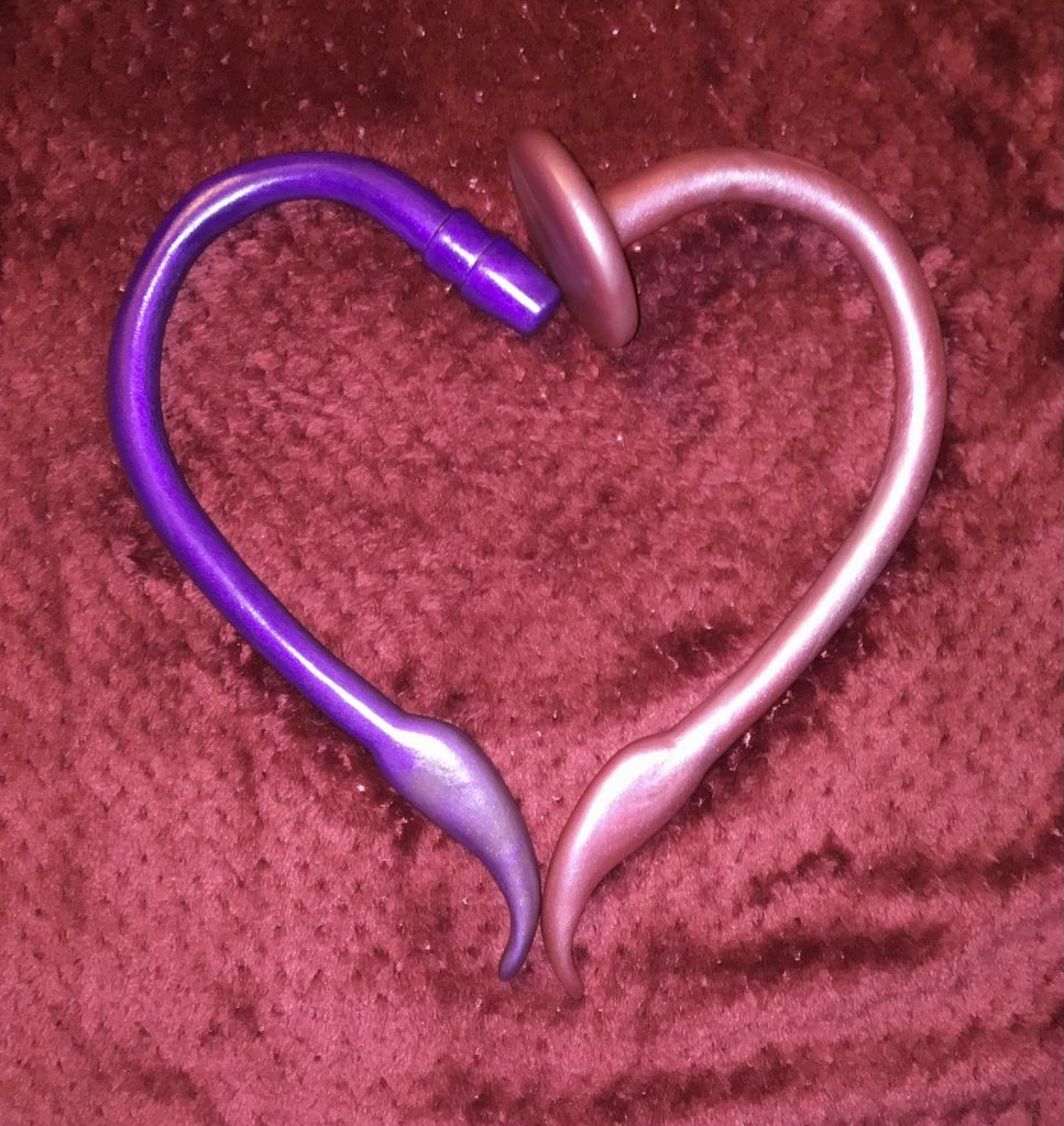 Both handles arranged in a heart shape